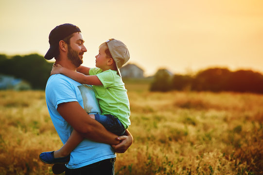 Happy Family. Father And Son Playing And Embracing The Outdoors. Father's Day