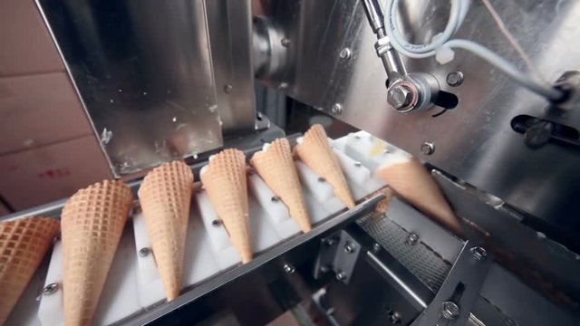 Modern ice cream automatic production line. Automatic equipment at the food factory. 1080p.