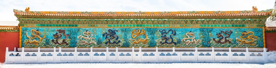 Panoramic view of dragon on the wall with the dragons in the forbidden city in Beijing (Nine Dragon Screen Wall)