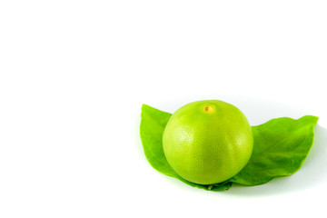 Lime with leaf isolated on a white background.
