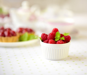 Raspberry fuits in a bowl on a table
