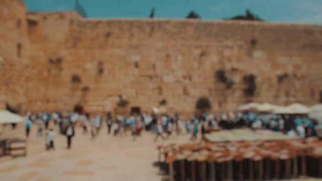 Jewish prayers at the Western wall in the old city of Jerusalem Israel - Blurred