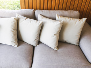 Fototapeta na wymiar Pillows on sofa Home interior decoration background