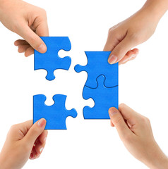 Hands and puzzle