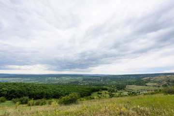 Fototapeta na wymiar View on moldovan village green landscape in summer time