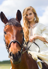 Fototapeta premium beautiful girl and horse