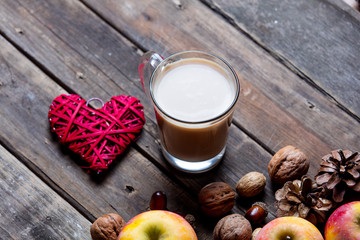 apples, fir-cones, cup of coffee, toy and nuts