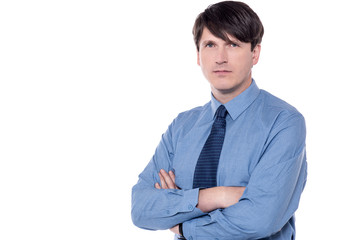 Male executive looking at the camera.