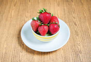 Fresh strawberry and juice on wood table. flat lay.