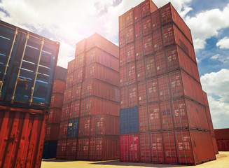 Fototapeta premium Colorful stack pattern of cargo shipping containers in shipping. import,export industrial