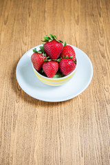 Fresh strawberry and juice on wood table. flat lay.