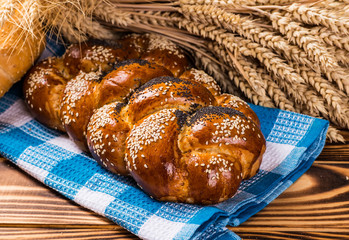 assortment of baked bread on wood table