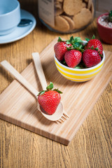 Fresh strawberry and juice on wood table. flat lay.