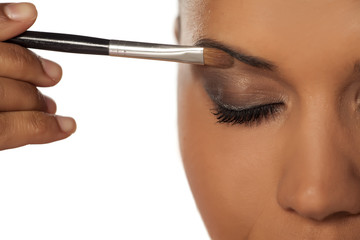 eye shadow applied with a brush - close up