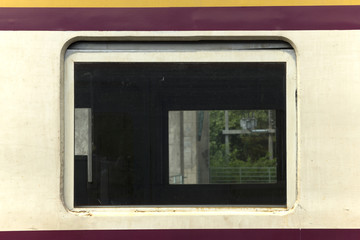 Old window of the train in Thailand.