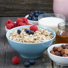 fresh breakfast products on a dark wooden background