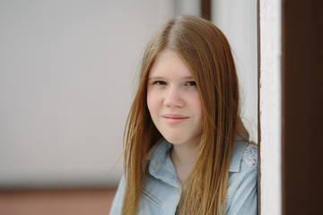 Portrait of young thinking girl