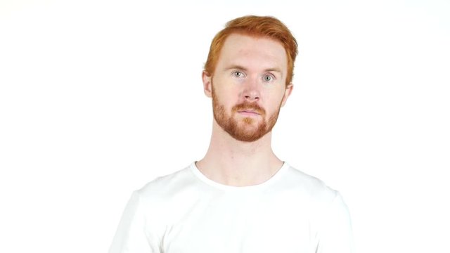 Handsome red hair man showing no sign, on white background