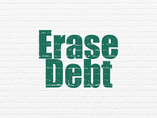 Obraz premium Business concept: Erase Debt on wall background