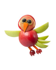 Flying bird made of apple on isolated background