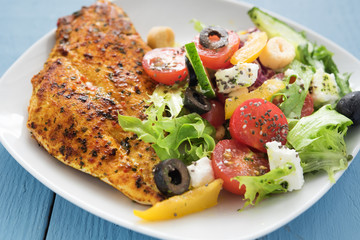 Grilled chicken with mediterranean salad