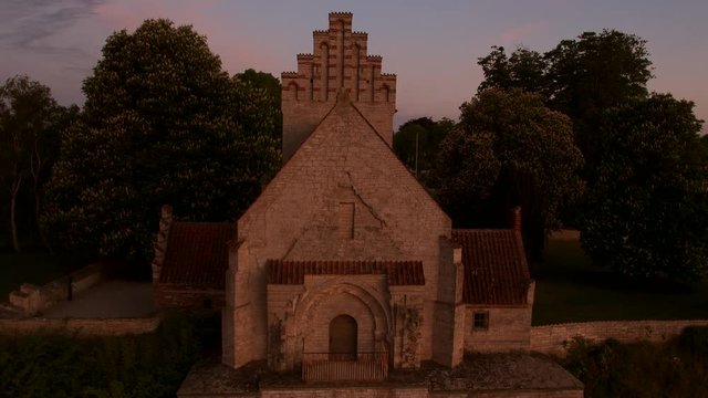 Church on the edge of a cliff by the sea - 4K Drone footage
