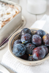 Preparing plums for cake