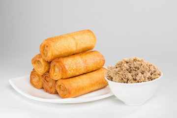pancakes with meat on white plate