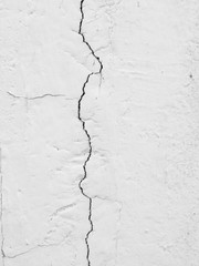 white wall with cracks