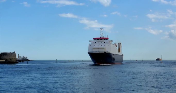 Big tanker ship at the entrance of Portsmouth bay