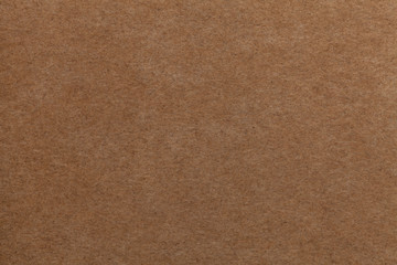 Brown old paper background. Thick cardboard.