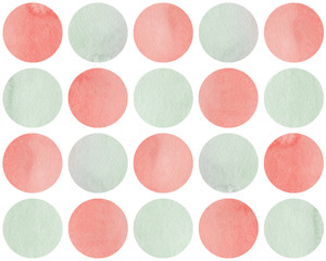 Watercolor circles in pink and light green color isolated over white.