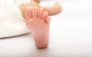 New Born adorable cute baby feet close up.