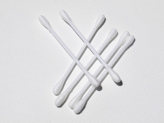 Cotton sticks isolated on the white paper background