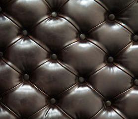 Black color sofa texture background.