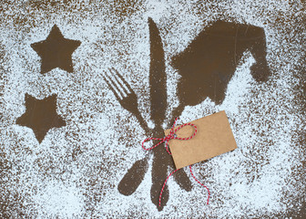 weihnachtliches Essen - Besteckabdruck im Puderzucker