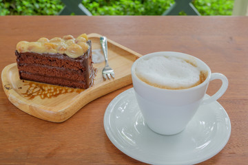 A cup of coffee and cake.
