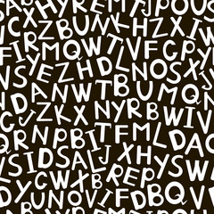 White doodle alphabet on the black  background. Letters seamless