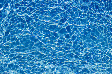 Beautiful pattern of blue water reflecting the sun.