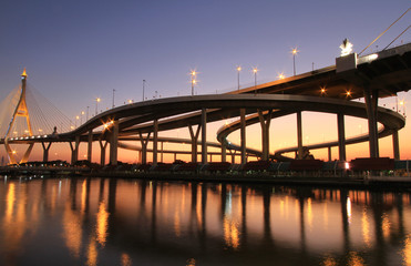 Obraz na płótnie Canvas Night view of Bhumibol Bridge in Thailand, also known as the Industrial Ring Road Bridge