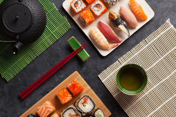Set of sushi, maki and green tea