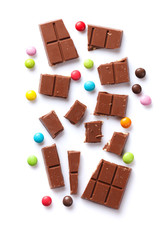 Broken chocolate bar and candies
