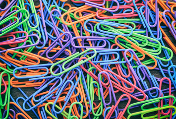 Colorful paperclips as background