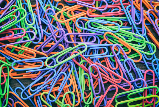 Colorful paperclips as background © Rawf8