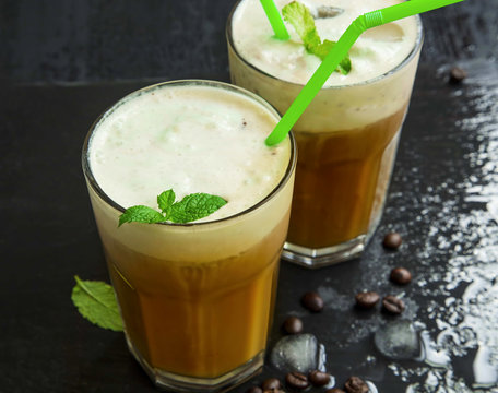 Iced frappe coffee with mint leaves