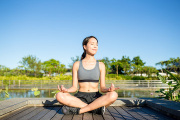 Fototapeta na wymiar Asia young woman practicing yoga