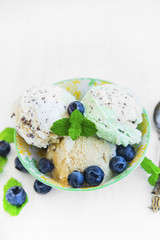 Icecream cups with blueberries and mint