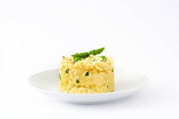 Risotto with peas, asparagus and parsley isolated on white background

