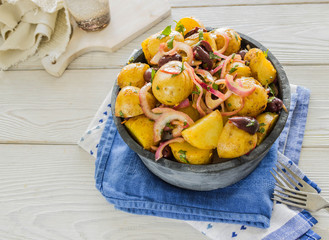 Rustic food: new potatoes, onions