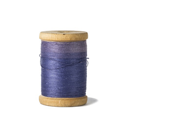 blue thread spool isolated on white background